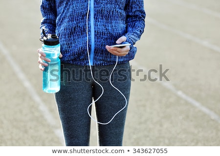 Stockfoto: Young Woman In Sports Clothing At Autumn Park