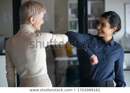 Stockfoto: Smiling Young Woman Saying Great Job