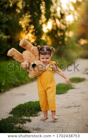 Сток-фото: Portrait Of A Little Girl In The Park