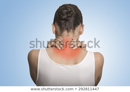 Foto d'archivio: Closeup Back View Tired Female Massaging Her Painful On Blue Background Back And Spine Disease