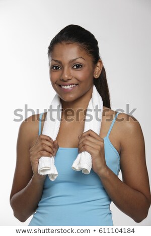 Zdjęcia stock: Portrait Of A Young Woman With Towel Around Neck And Holding Wat