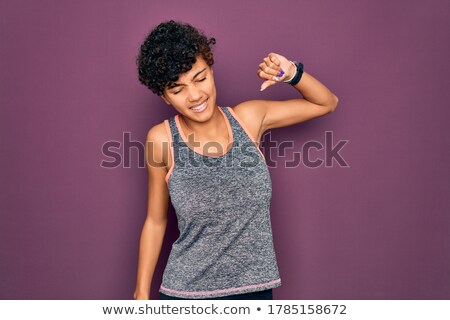 Foto d'archivio: Beautiful Afro American Sportswoman Resting