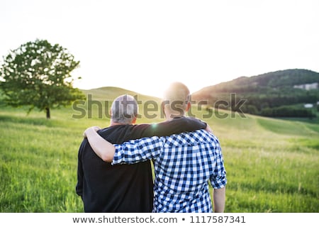 Stock fotó: Father And Son In Forest On A Meadow