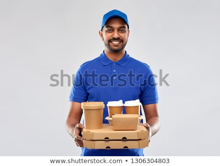 Stock foto: Happy Indian Delivery Man With Food And Drinks