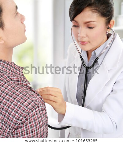 Stok fotoğraf: Doctor Taking Her Patients Pulse