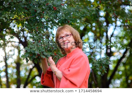 Stock photo: Woman Shows Her Beautiful Hair In Backlight