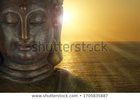 Stockfoto: Bronze Red Zen Buddha Statue Meditating Front