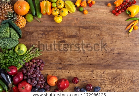 Foto stock: Different Vegetables For Eating Healthy On Wooden Background