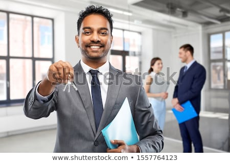 Zdjęcia stock: Indian Businessman Or Realtor In Empty Office Room