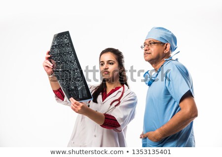 Сток-фото: Indian Doctor Looking At Spine X Ray