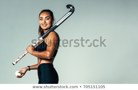 Foto stock: Portrait Of Hockey Ball Player With Hockey Stick