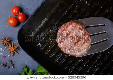 Stock photo: Delicious Burger Preparation In Grill Pan