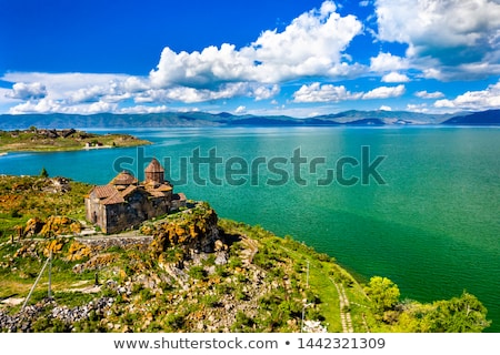Foto stock: Ancient Armenian Church On Lake Sevan Armenia