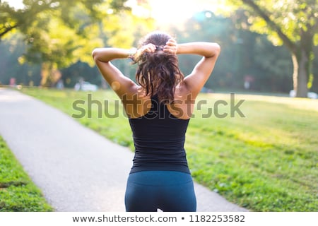 Foto stock: Young Woman Making Exercise In Gym