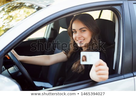 Foto stock: Girl Showing Driving Licence