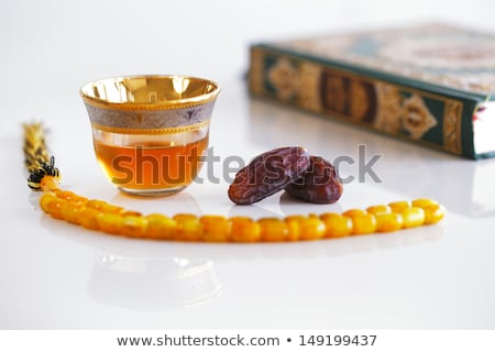 Foto stock: The Masbaha Also Known As Tasbih With The Quran