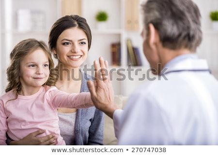 Stok fotoğraf: Mother And Child Girl Visit Pediatrician Office