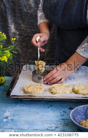 Foto stock: Raw Veggie Burgers On A Rustic Blue Table