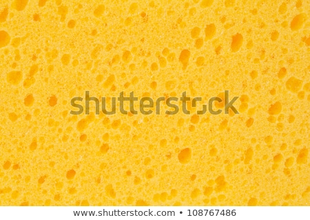 Foto stock: Sponge Yellow For Washing Pattern Cleaning Background