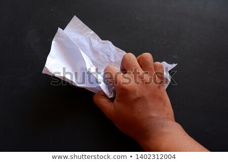 Foto stock: Top View Of Hands Holding Wrinkled Papers Isolated On White