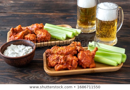 Stockfoto: Bowl Of Buffalo Wings With Blue Cheese Dip