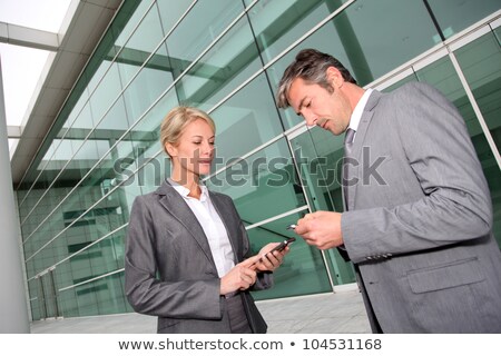 Zdjęcia stock: Business Partners Exchanging Phone Numbers