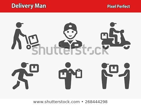 Stock foto: Delivery Man With Box And Clipboard At Warehouse