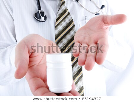 Foto stock: Doctor Holding A Pill Solution For You Closeup