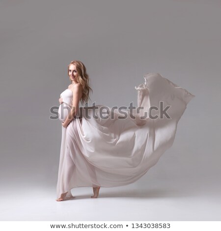 Stockfoto: Pregnant Woman With Flying White Cloth