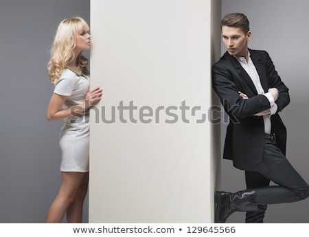 Foto stock: Two Young Women Flirting With The Camera