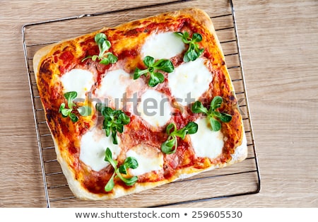 Foto d'archivio: Fresh Homemade Square Pizza With Vegetables Basil