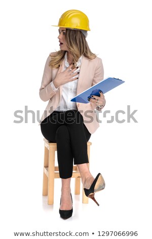 [[stock_photo]]: Shocked Engineer Student Wearing Blue Papers Looks To Side