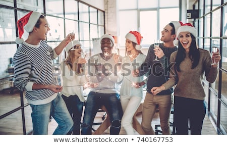 Stockfoto: Happy Team Celebrating Christmas At Office Party