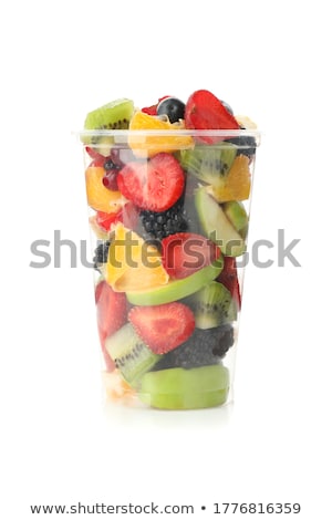 Stockfoto: Grape And Strawberry In A White Cup