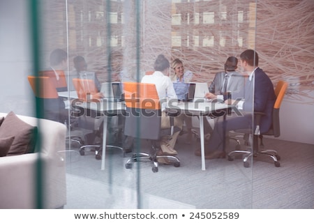 People In White Handshaking On Tablet Foto stock © dotshock