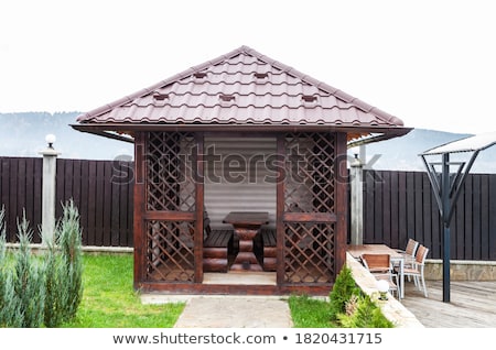 [[stock_photo]]: Tiled Roof Of Wooden Arbor