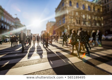 Сток-фото: Crowd Of People Walking On The Street In Bokeh