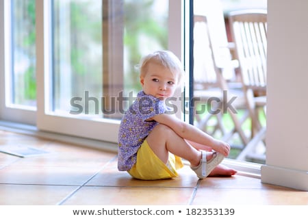 Сток-фото: Next Door Girl Smiling In Her Living Room