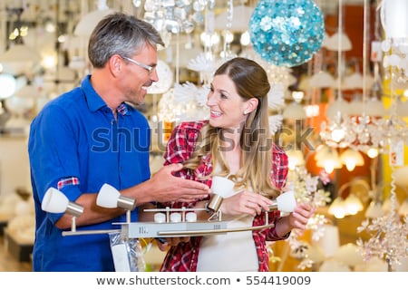 Stock photo: Customer In Hardware Store Asking Clerk For Help