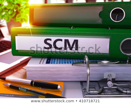 Foto stock: Green Office Folder With Inscription Scm