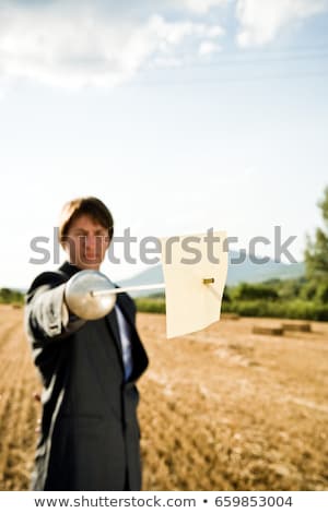 ストックフォト: Businessman Fencing In Wheat Field