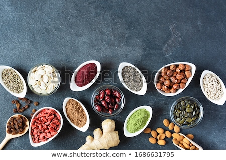 Stockfoto: Various Superfoods In Small Bowl On Black Background