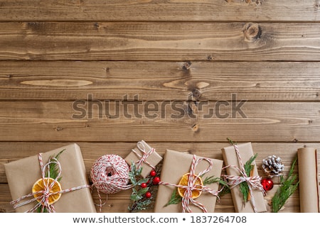 Stockfoto: Presents For Christmas With Opened Christmas Present And Fir Tre