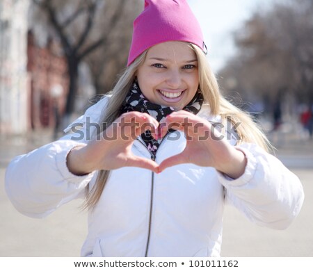 Stock foto: Teenage Girls Showing Peace Hand Sign At Park