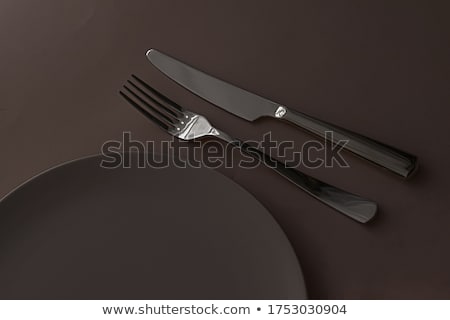 Download Empty Plate And Cutlery As Mockup Set On Dark Brown Background Top Tableware For Chef Table Decor A Stock Photo C Anneleven Stock 10483624 Stockfresh