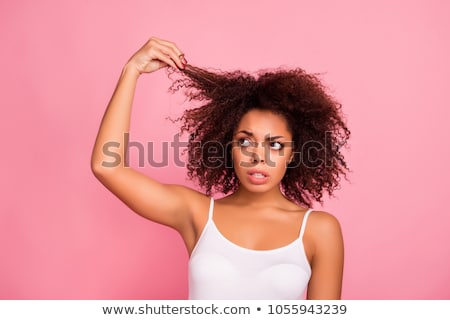 Stockfoto: Pretty Black Hair Woman Holding Her Hair