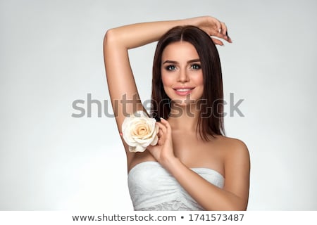 Stock fotó: Beautiful Young Woman Massaging Her Face
