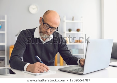 Stockfoto: Young Man Writing