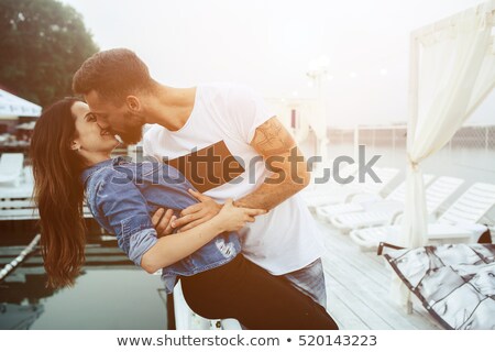 Stock fotó: Happy Wooman Kissed By His Boyfrend