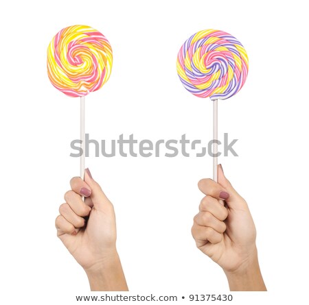 ストックフォト: Female Arms Holding Lollipop On Stick